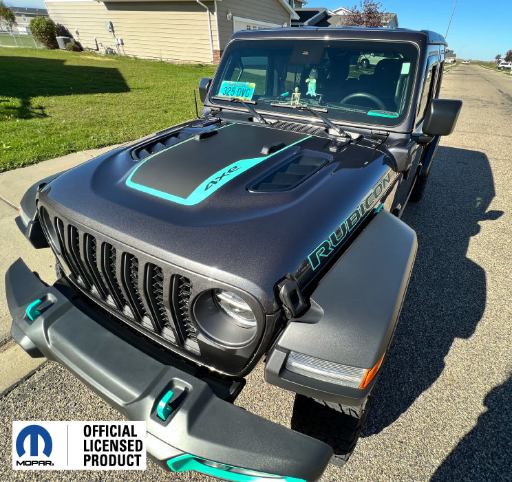 black Jeep Rubicon with teal stripes