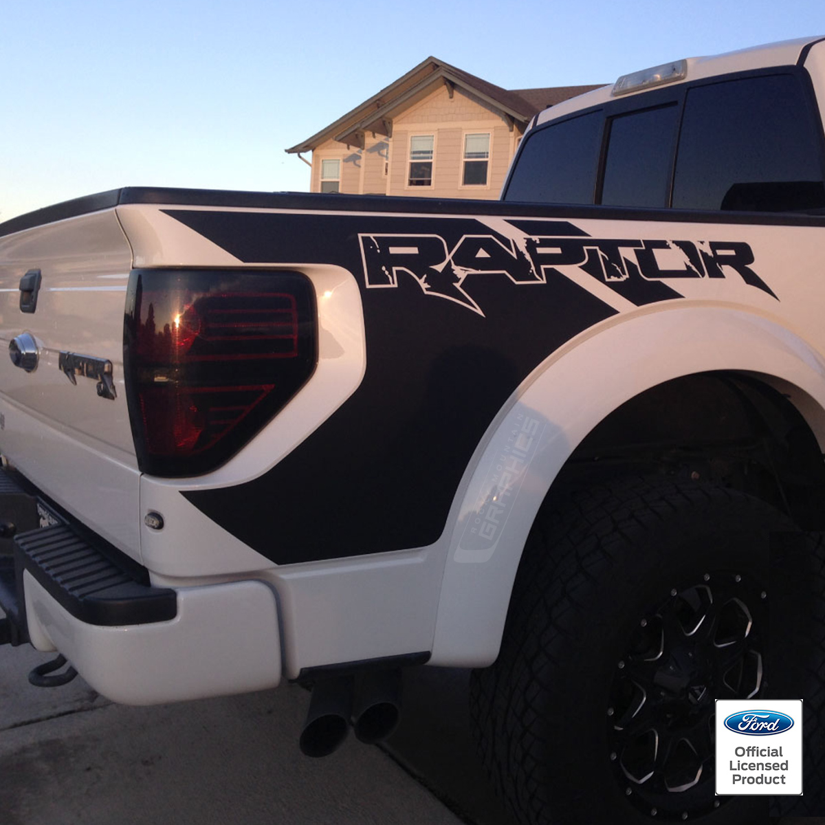 Ford Raptor truck with Ford graphics on side