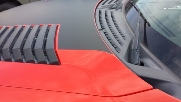 car hood with red and black custom graphic designs